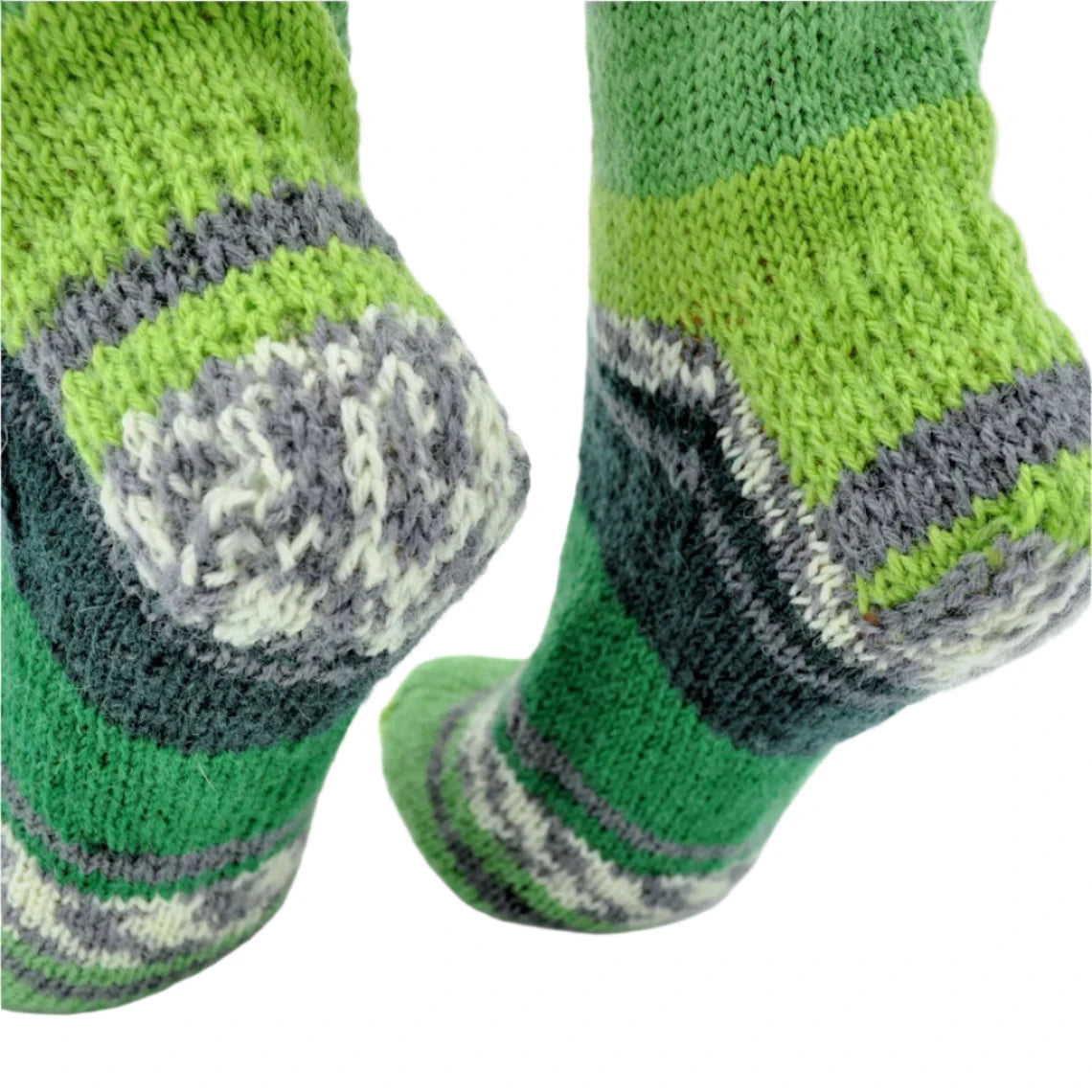 Vibrant green striped socks, crafted from soft materials for stylish comfort, adding color to outfits.